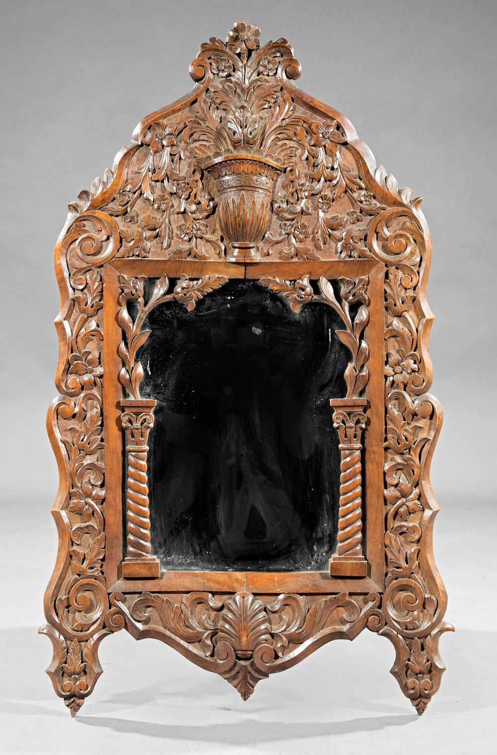 Appraisal: Small Spanish Baroque-Style Carved Walnut Mirror th c arched crest