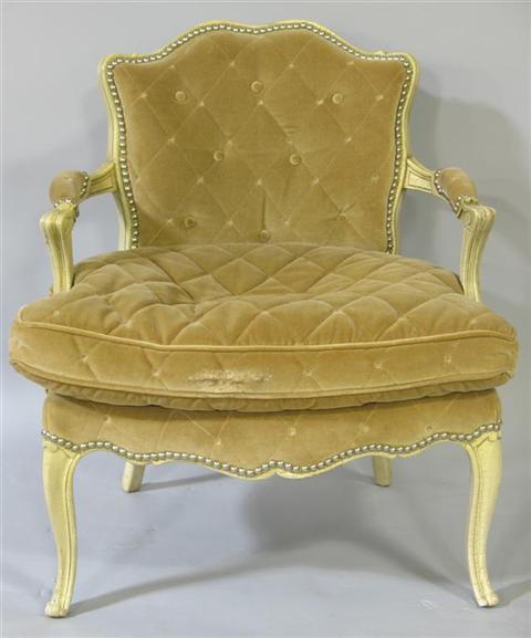 Appraisal: LOUIS XV STYLE CHILD'S ARMCHAIR The shaped button-tufted back over