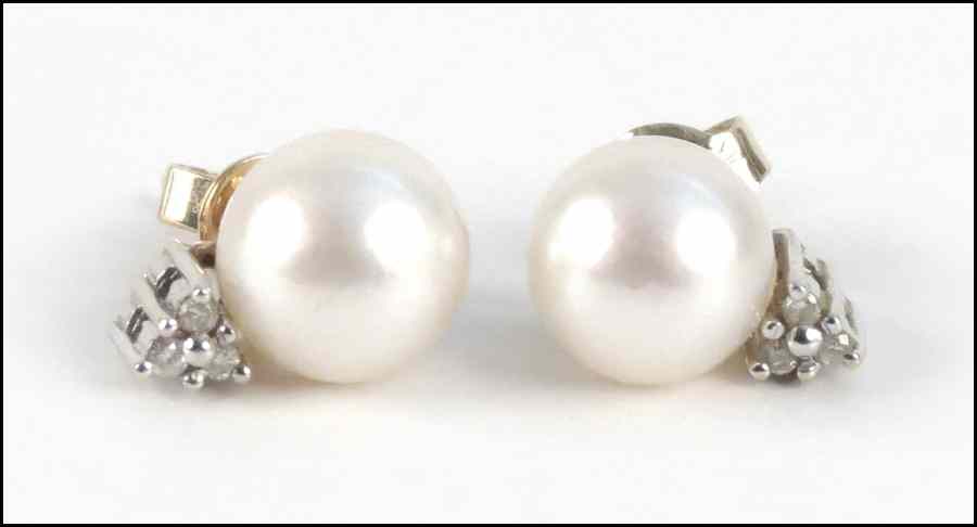 Appraisal: PEARL DIAMOND AND KARAT YELLOW GOLD EARRINGS Pearls are approximately