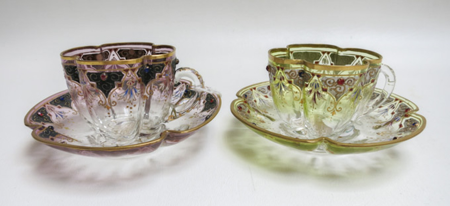 Appraisal: TWO MOSER STYLE GLASS CUP AND SAUCERS the cups of