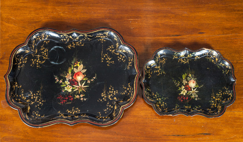 Appraisal: TWO VICTORIAN BLACK AND PARCEL-GILT PAPIER M CH TRAYS x