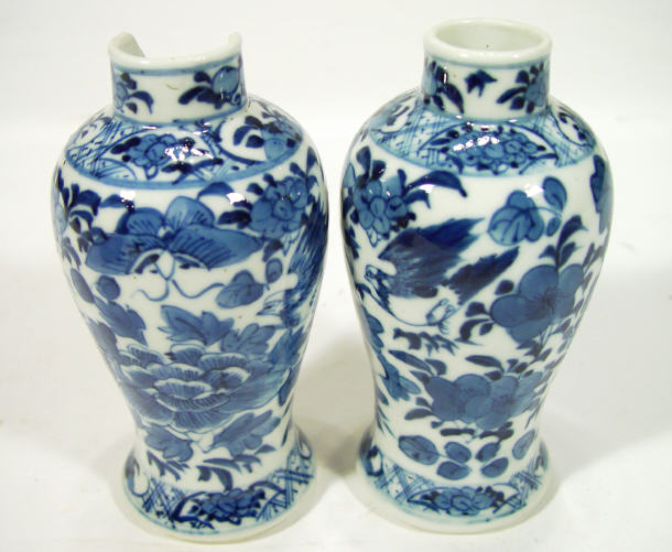 Appraisal: Two small oriental baluster vases hand painted with blue peony