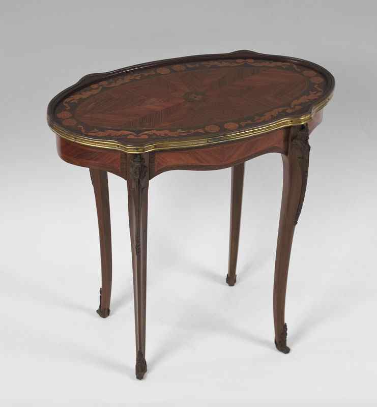 Appraisal: OVAL TOP FRENCH INLAID TABLE Top inlaid with center medallion