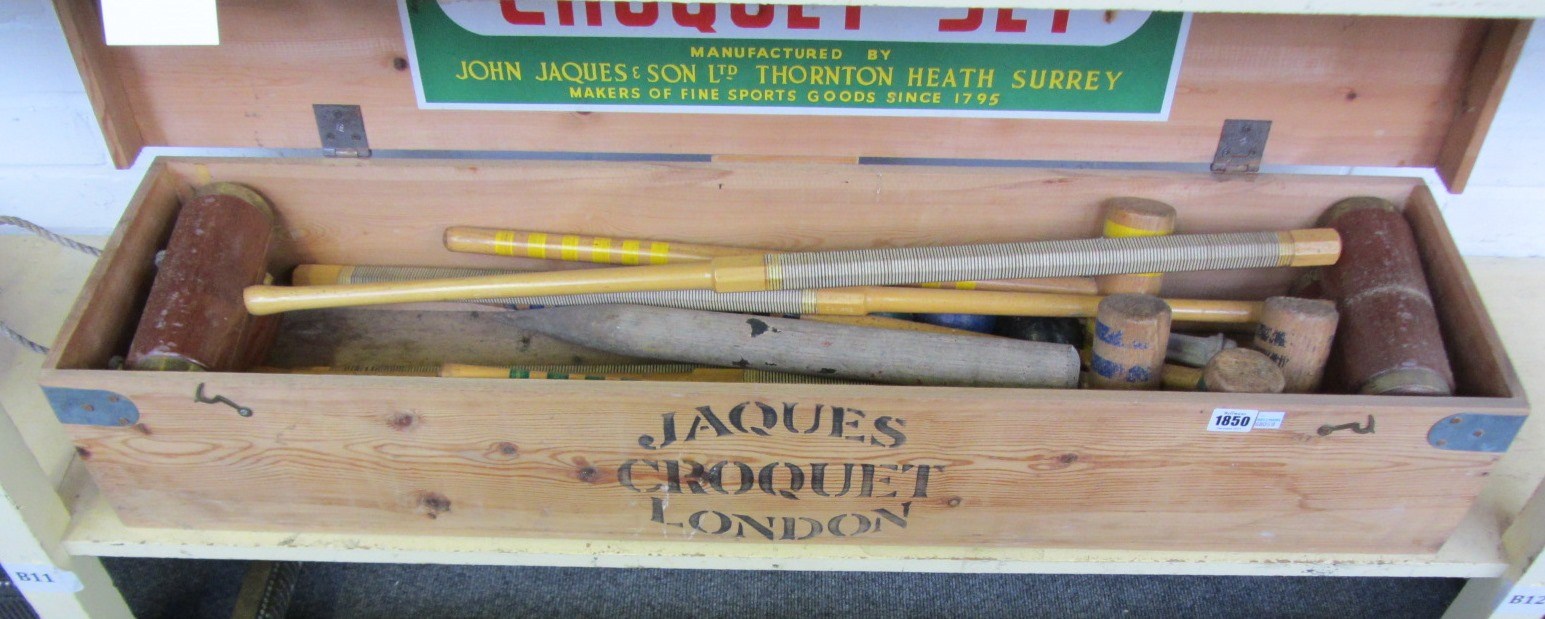 Appraisal: A Jacques croquet set including four wooden mallets stamped with