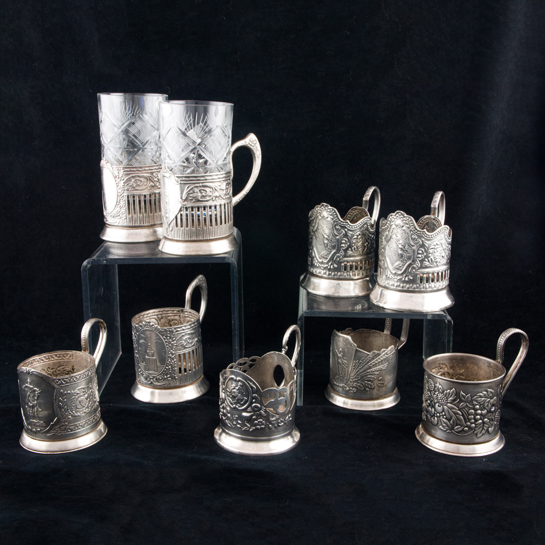 Appraisal: A LOT OF RUSSIAN PLATED TEA GLASS HOLDERS FASHIONED IN