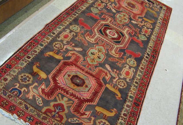 Appraisal: PERSIAN MESHKIN CARPET Ardebil Province northwestern Iran geometric medallion animal