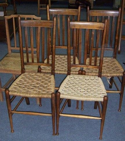 Appraisal: A set of four dining chairs each with splat back