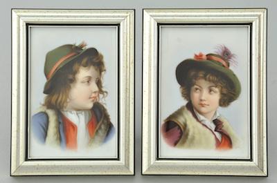 Appraisal: A Pair of Hand Painted Porcelain Portrait Plaques of Children