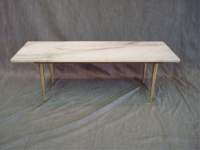 Appraisal: Mid Century marbletop low table w brass legs Central Park