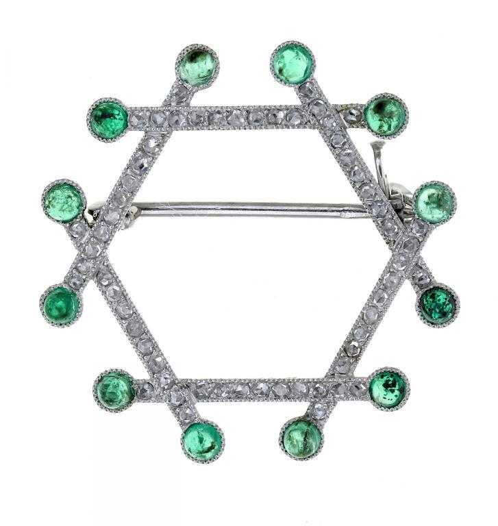 Appraisal: A CARTIER EMERALD AND DIAMOND BROOCH in the form of