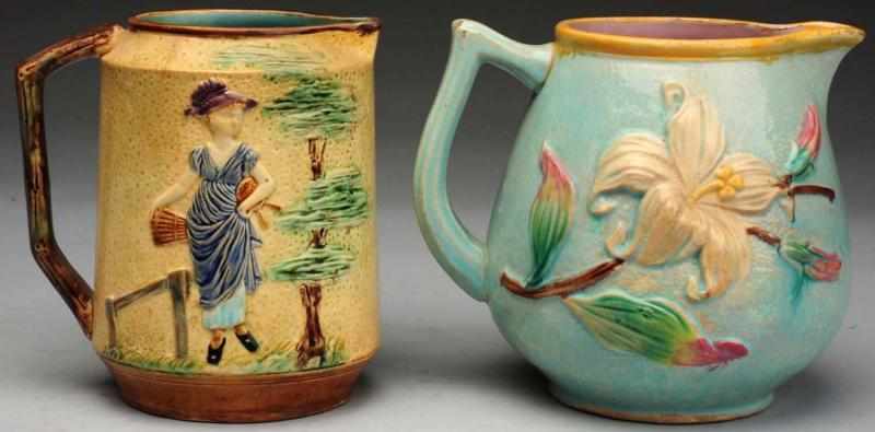 Appraisal: Pair of th Century Majolica Water Pitchers Includes one with