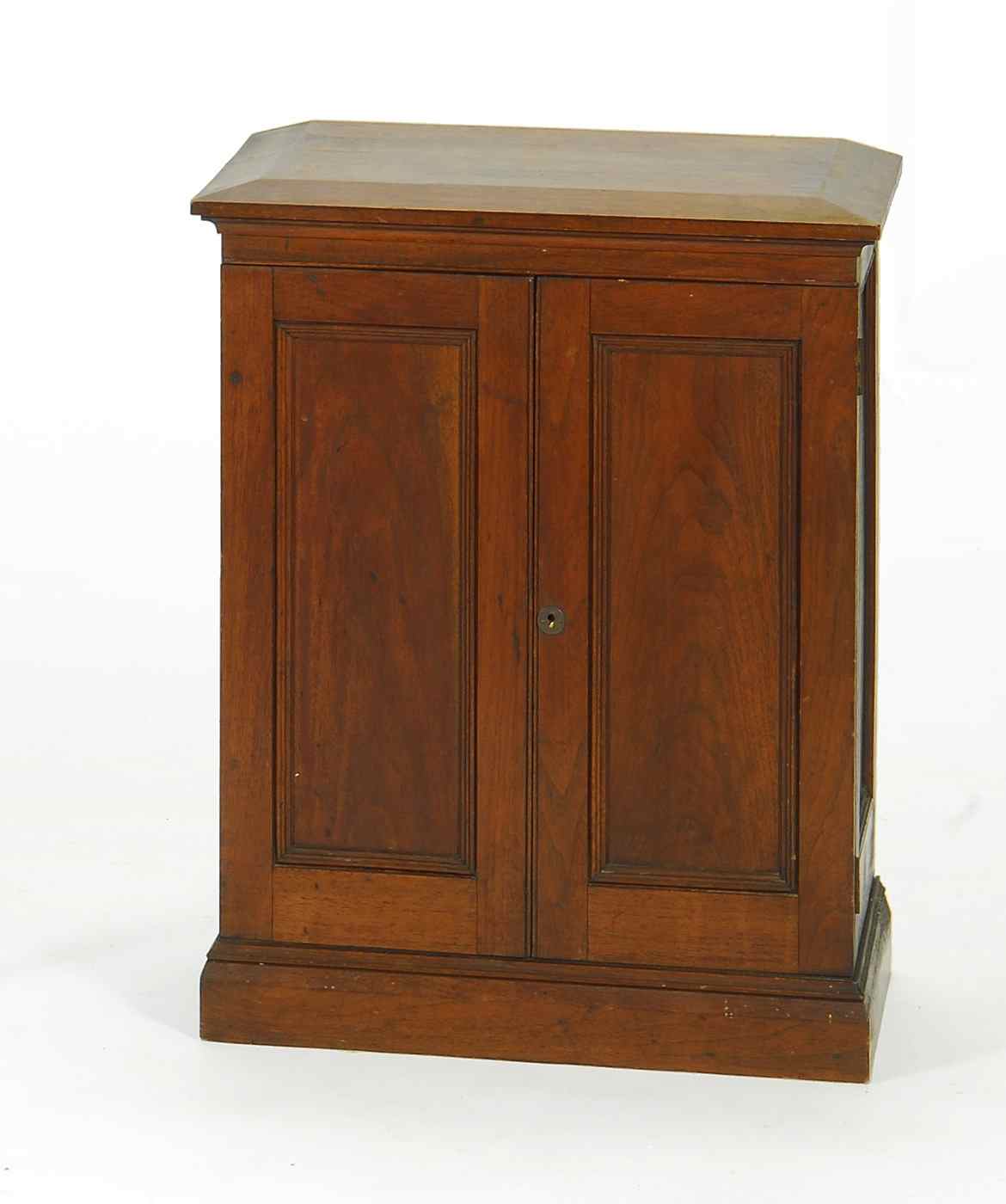 Appraisal: WOODEN TWO-DOOR DENTAL CABINETLate th CenturyIn walnut Paneled doors conceal