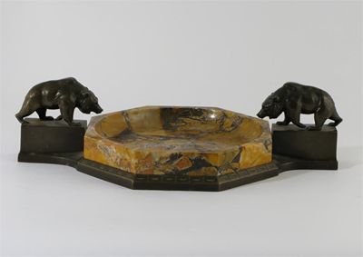 Appraisal: A bronze and sienna marble centrepiece cast with two bears