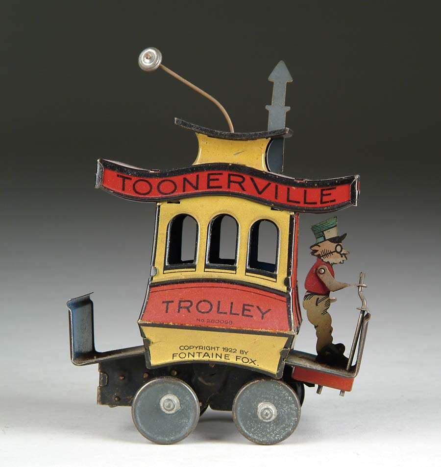 Appraisal: TIN WINDUP TOONERVILLE TROLLEY BY NIFTY The classic Toonerville that