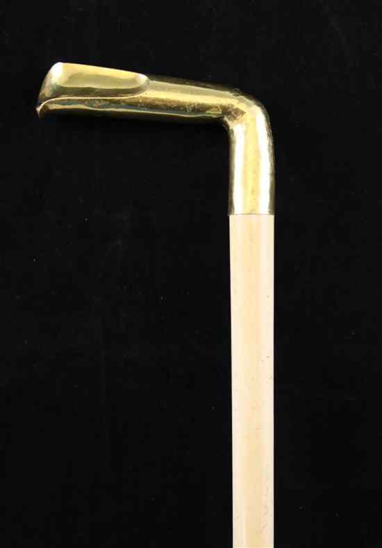 Appraisal: A Victorian gold mounted ivory tusk walking stick in Estimate