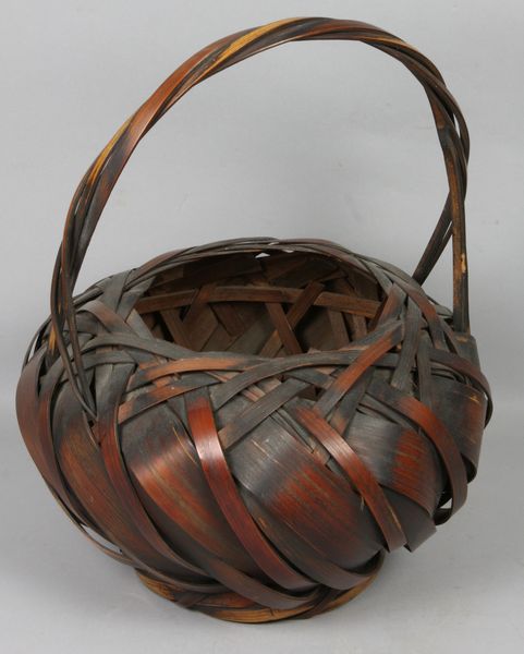 Appraisal: Old Japanese Ikebana basket having bulb shape h x w