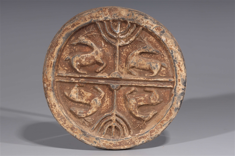 Appraisal: Korean ceramic roof tile circular form depicting deer Condition Some