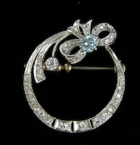 Appraisal: Diamond Circle Bow Pin ca 's k white gold circle