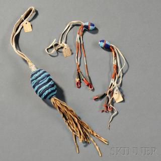 Appraisal: Group of Plains Beaded Items a fringed egg-shaped form with