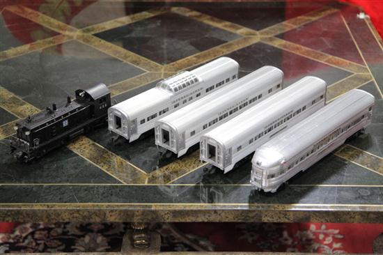 Appraisal: FIVE LIONEL TRAIN CARS Santa Fe Diesel Switcher locomotive No