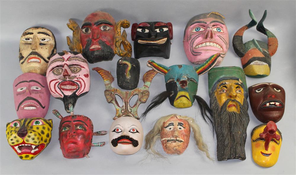 Appraisal: GROUP OF MEXICAN MASKS of polychrome painted wood papier mache