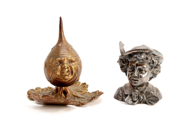 Appraisal: A novelty gilt-metal crying turnip inkwell Raised on a gilt-metal