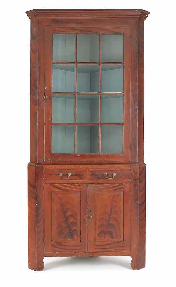 Appraisal: Pennsylvania painted pine two-part corner cupboard ca retaining its original