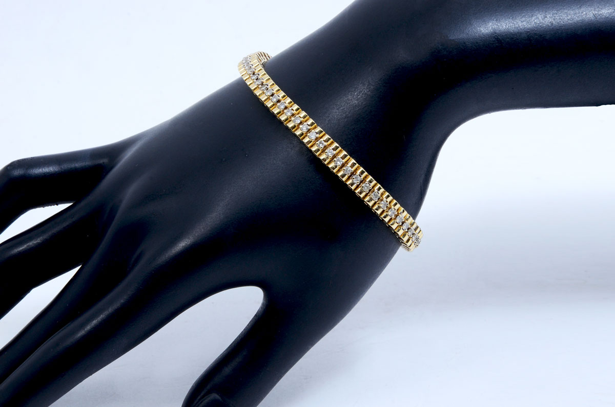 Appraisal: K CTW DIAMOND BRACELET K yellow gold bracelet contains round