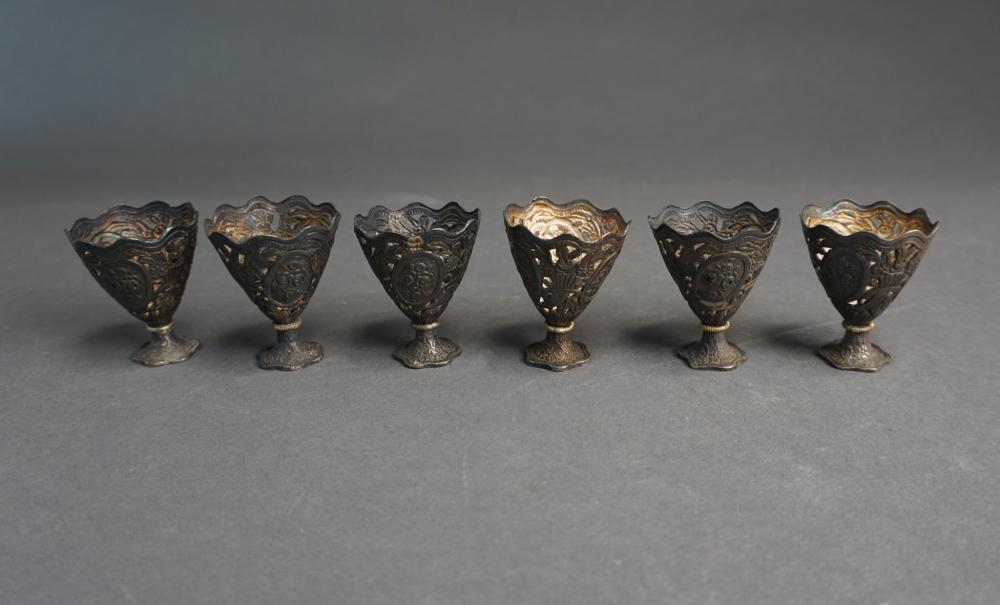 Appraisal: SIX OTTOMAN TUGHRA MARKED- SILVER PARTIALLY RETICULATED ZARF CUPS CGW