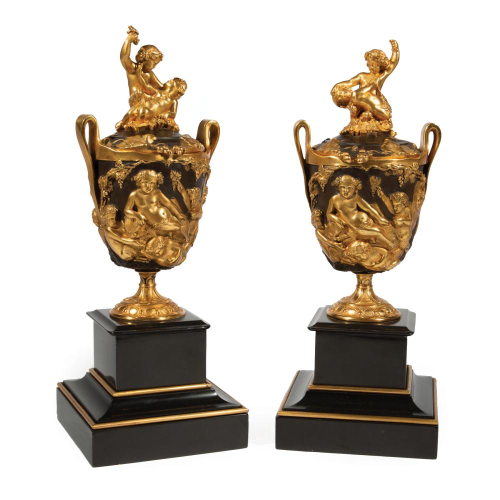 Appraisal: Pair of Empire-Style Gilt and Patinated Bronze Covered Urns th