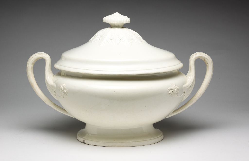 Appraisal: ENGLISH CREAMWARE TUREEN Late th-early th century Footed tureen with