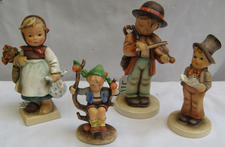 Appraisal: FOUR GERMAN HUMMEL FIGURES including Little Fiddler HUM TM- in