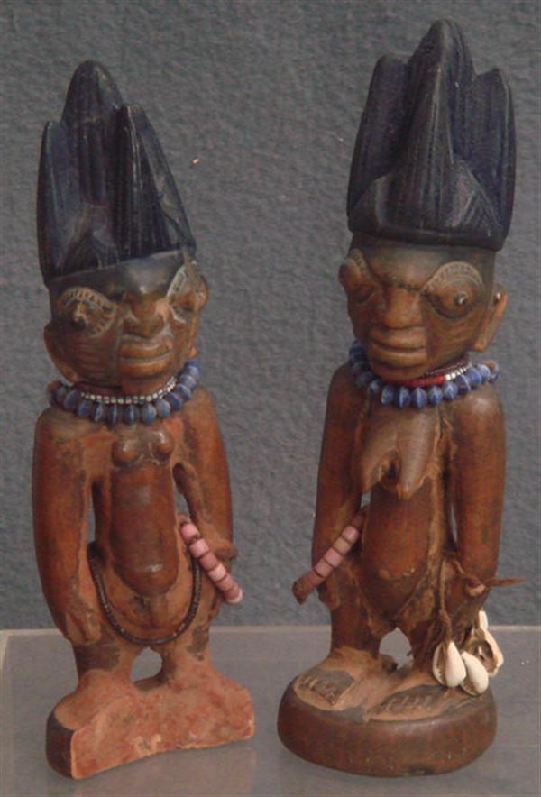 Appraisal: Pr carved wood Ibeji figures Yoruba tribe Nigeria both with