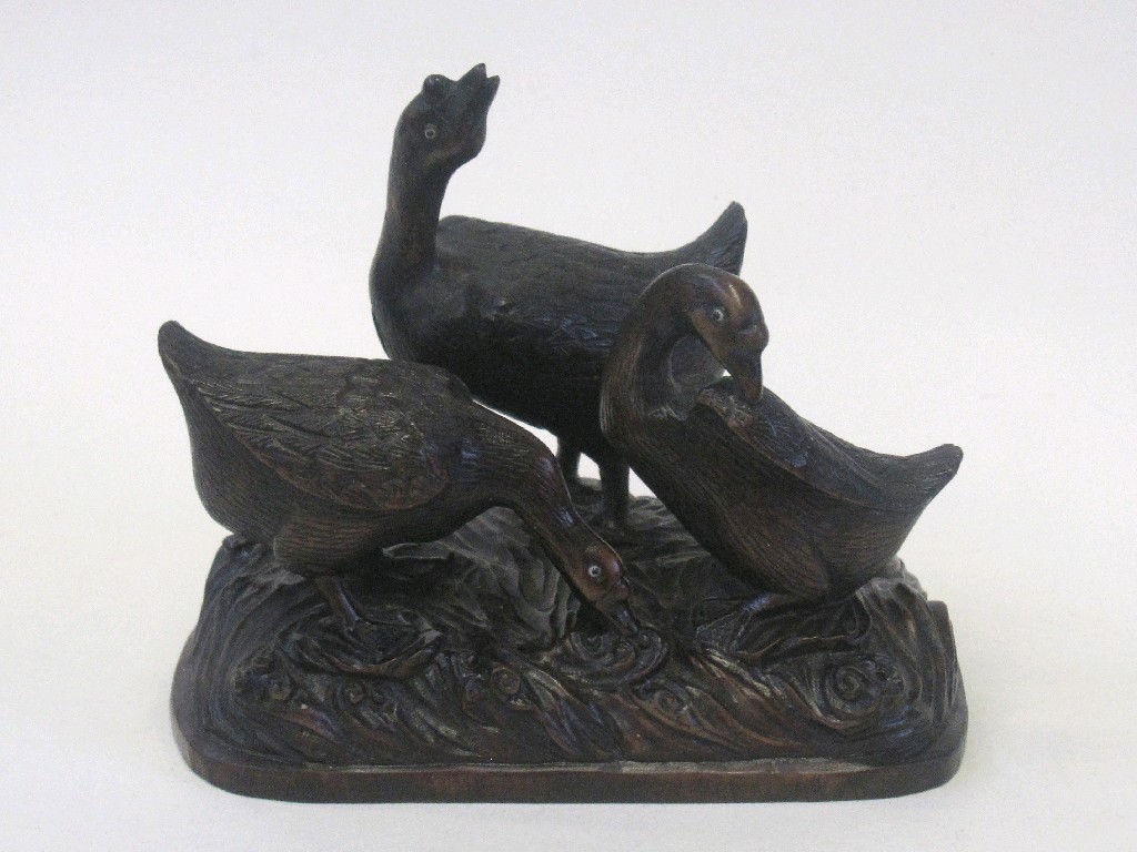 Appraisal: Oriental carved wooden figure group of three geese