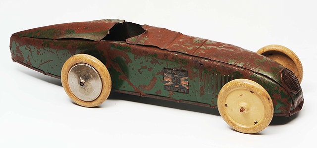 Appraisal: A CLOCKWORK WIND UP TINPLATE TOY OF AN M G