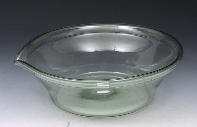 Appraisal: A NAILSEA GLASS CREAM BOWL with folded rim and pouring