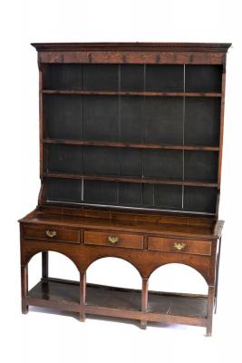 Appraisal: An th Century Welsh oak dresser with enclosed rack above