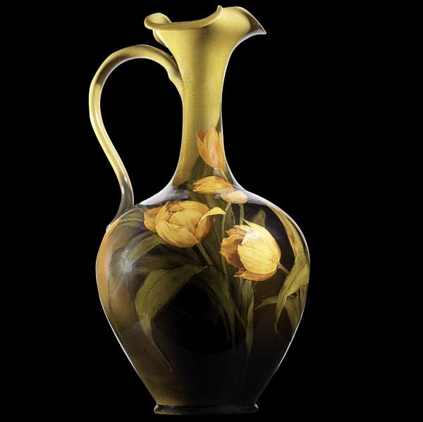 Appraisal: MATTHEW DALYROOKWOODTall Standard glaze pitcher Flame mark A W MAD