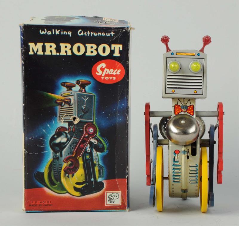 Appraisal: Japanese Tin Litho Plastic Walking Mr Robot O B In