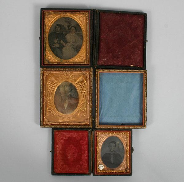 Appraisal: Early tintypes in leather cases famly and portrait pictures Tallest