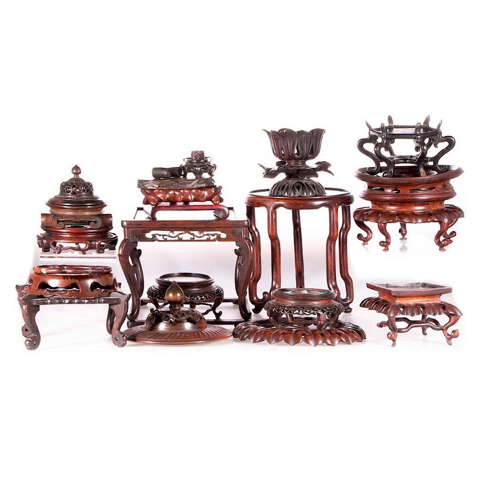 Appraisal: Collection of twenty Chinese stands and lids Twenty late th