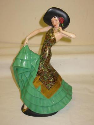 Appraisal: A CROWN DEVON FIELDINGS POTTERY FIGURE modelled as an Art