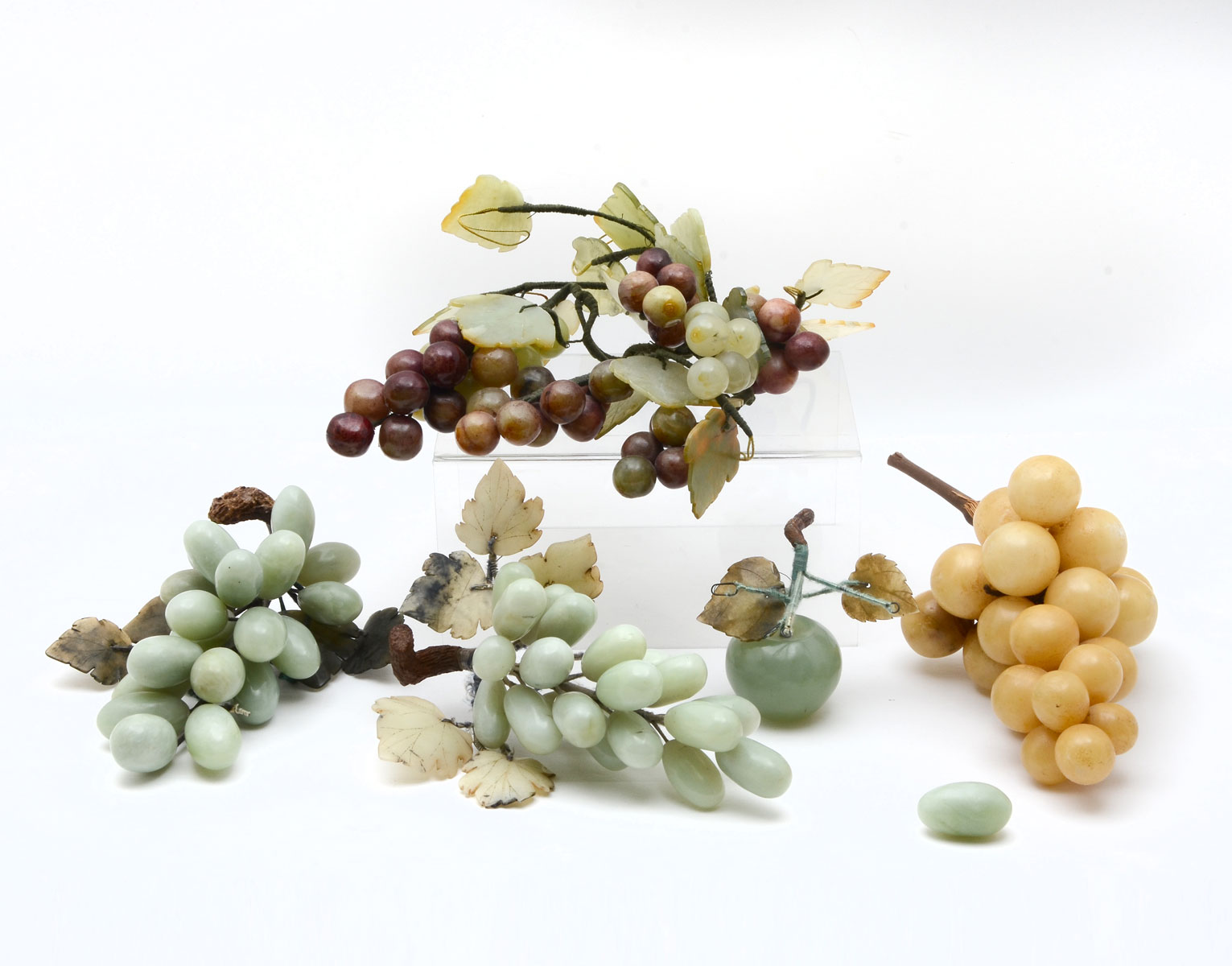 Appraisal: CHINESE CELADON JADE HARDSTONE GRAPE CLUSTERS Comprising - Grape clusters