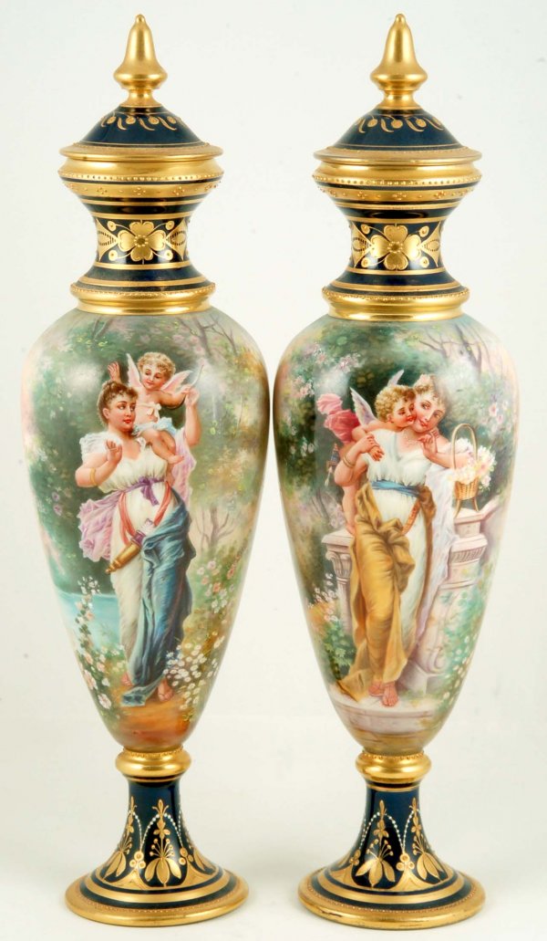 Appraisal: A pair of Dresden covered urns Baluster form bodies with