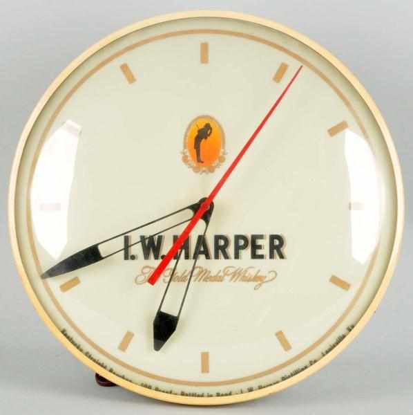 Appraisal: Harper Whiskey Advertising Clock Description Working condition lights up Condition