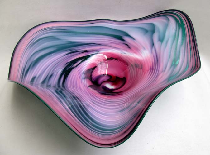 Appraisal: ART GLASS BOWL layered glass with swirling colors and metallic