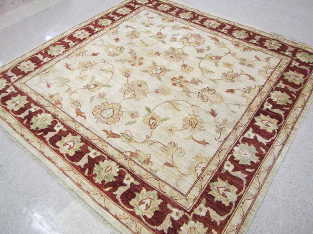 Appraisal: A SQUARE ORIENTAL CARPET Pakistani Persian overall floral design on