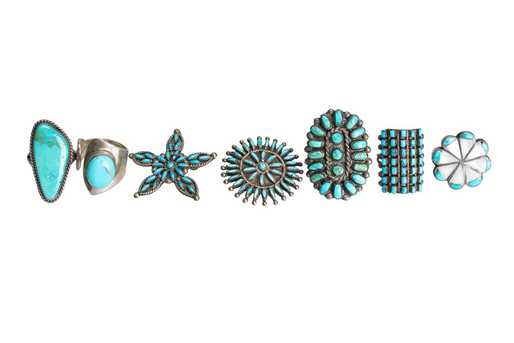 Appraisal: GROUP OF SEVEN TURQUOISE STERLING PIECEScomprising five rings and two