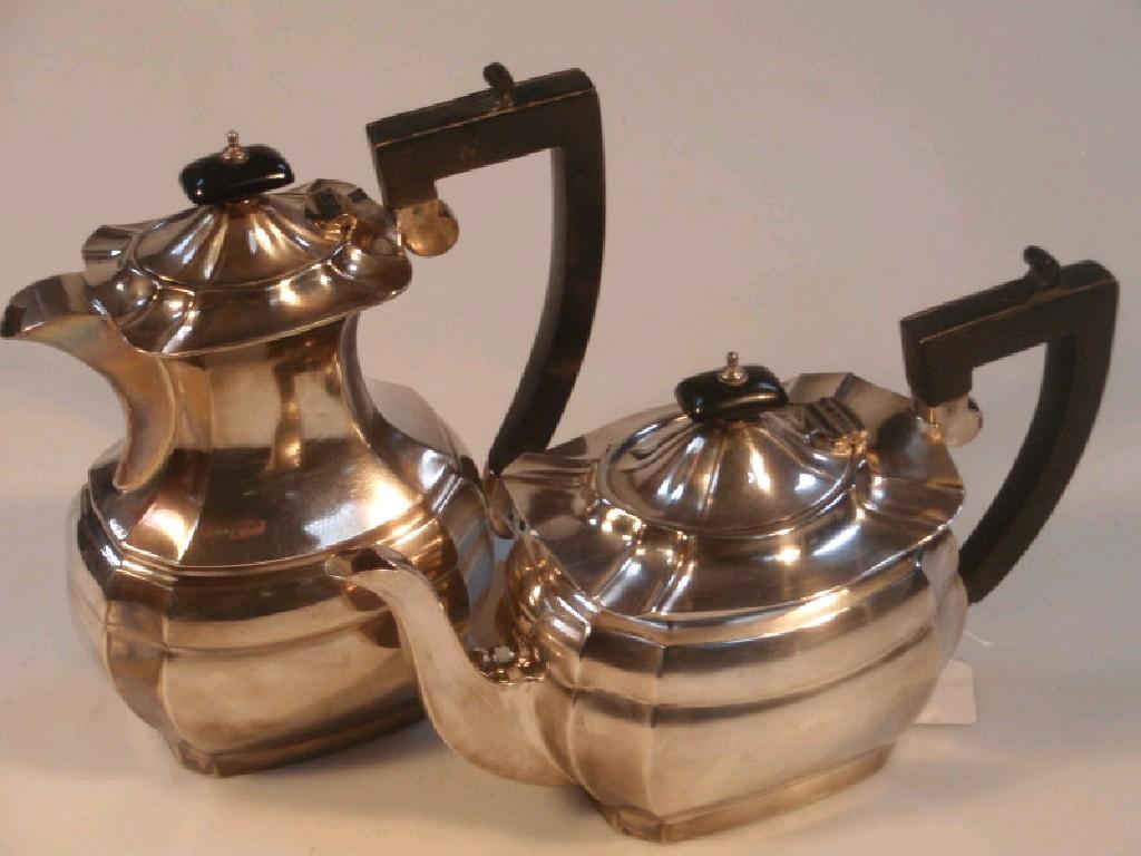 Appraisal: A George V silver tea pot and hot water jug