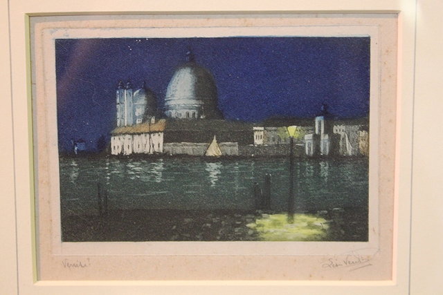 Appraisal: A pair of Venetian prints showing canal scenes at night